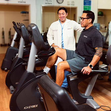 Dr. Chiu and Tuan Pham at the gym