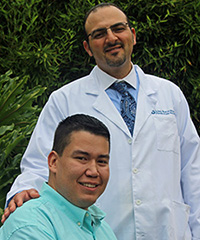 Image of joint replacement patient Bryant and Dr. Andrew Wassef