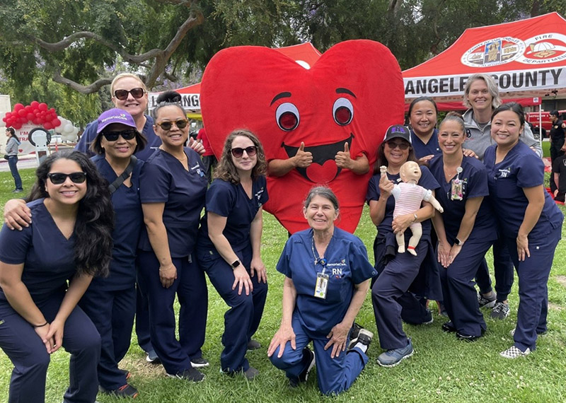 MemorialCare Long Beach Medical Center nurses at the Sidewalk CPR event prepare to train and educate their local community about Hands-Only CPR.
