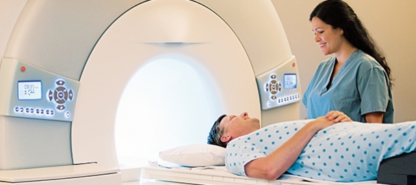 Image of a man undergoing a CT coronary artery calcium scan at MemorialCare Saddleback Medical Center